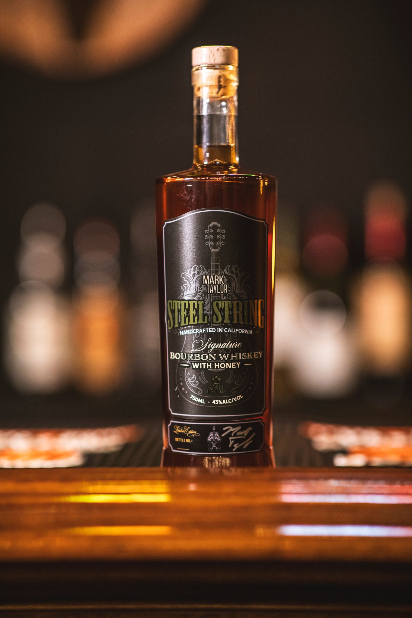 Steel Strings Whiskey bottle at launch event at Holiday Inn Nashville Airport